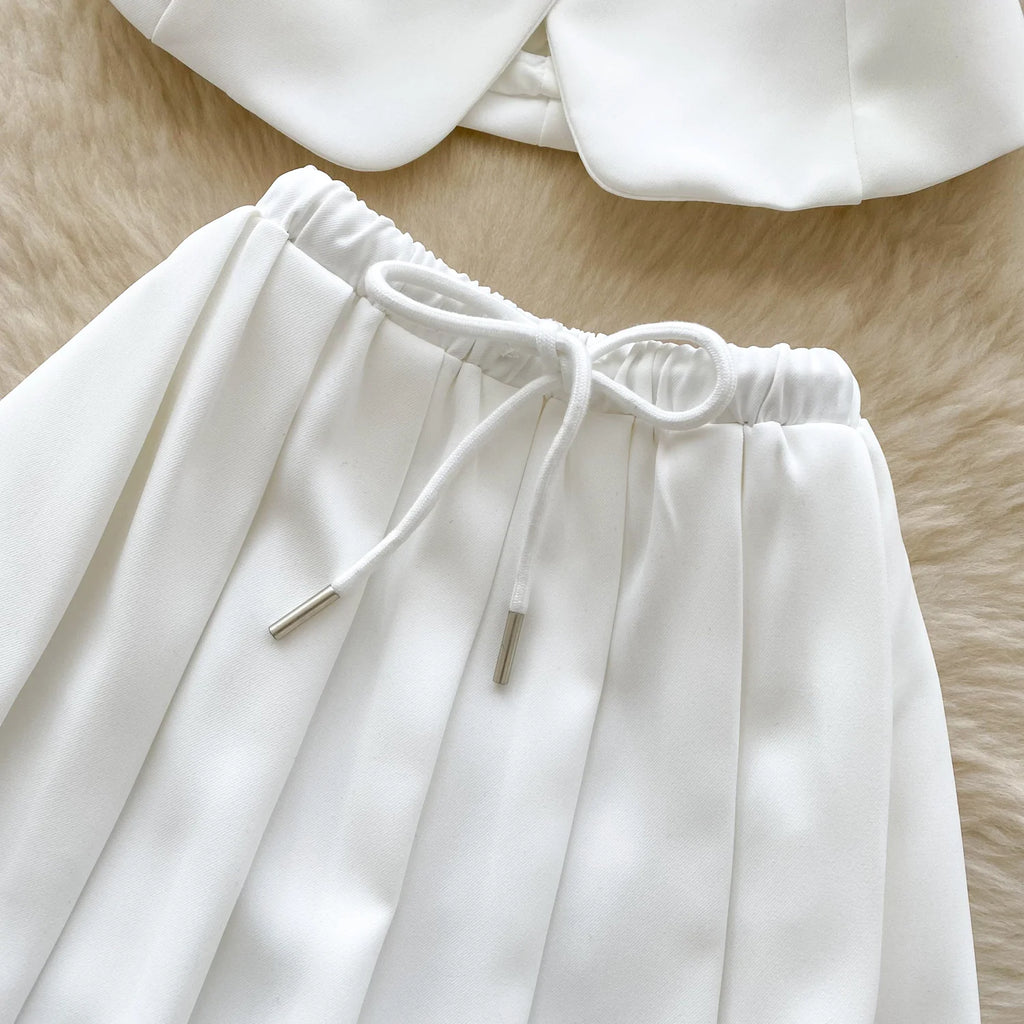 Chic Sleeveless Top & Pleated Mini Skirt Set