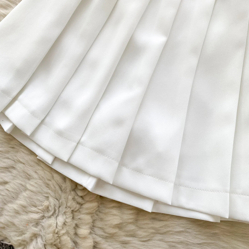 Chic Sleeveless Top & Pleated Mini Skirt Set