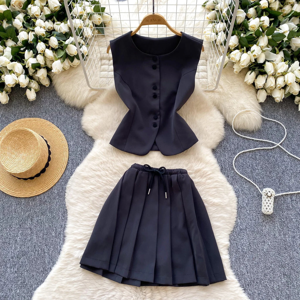 Chic Sleeveless Top & Pleated Mini Skirt Set