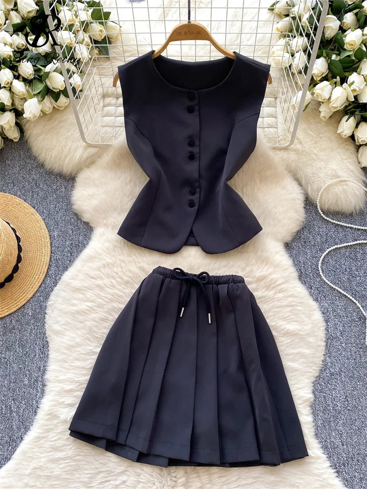 Chic Sleeveless Top & Pleated Mini Skirt Set
