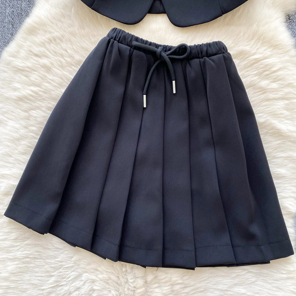 Chic Sleeveless Top & Pleated Mini Skirt Set