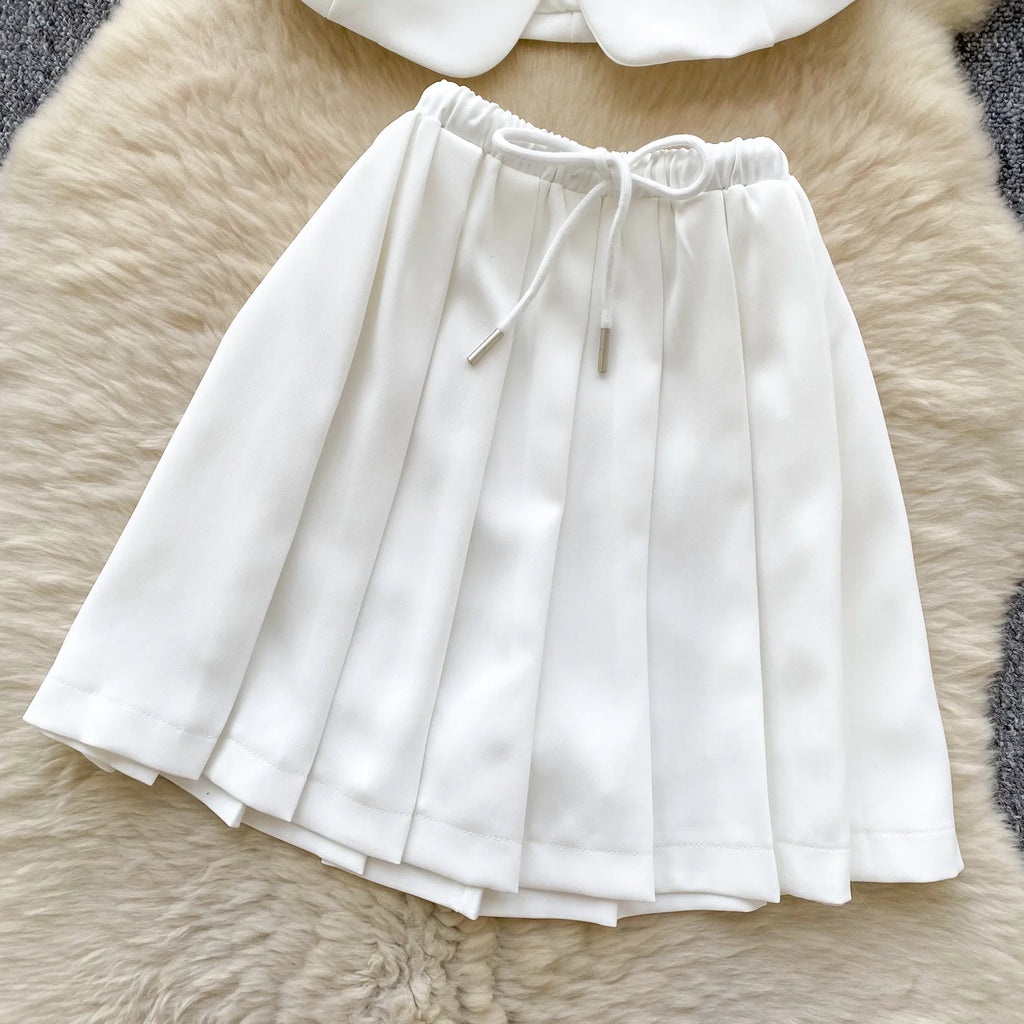 Chic Sleeveless Top & Pleated Mini Skirt Set