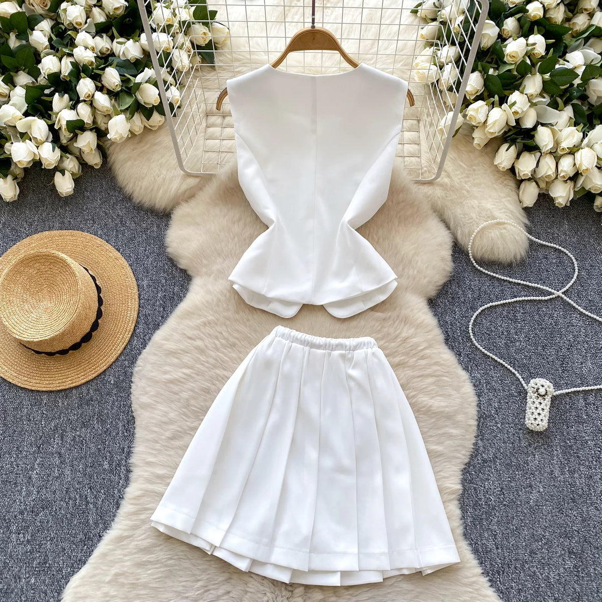 Chic Sleeveless Top & Pleated Mini Skirt Set