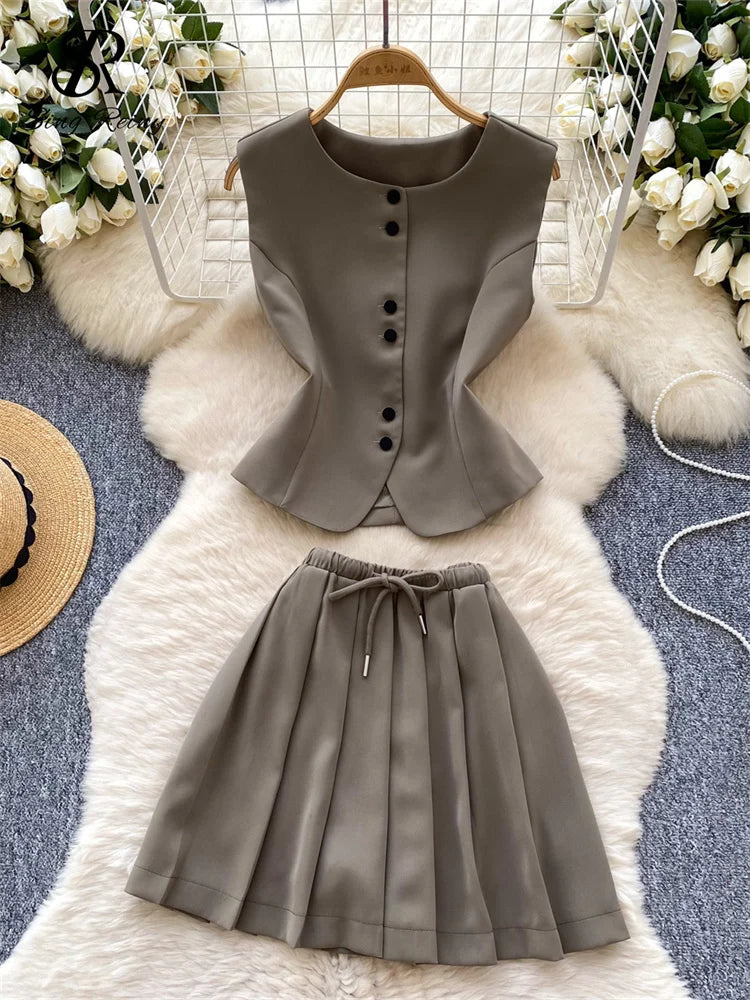 Chic Sleeveless Top & Pleated Mini Skirt Set