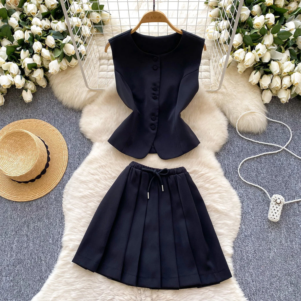 Chic Sleeveless Top & Pleated Mini Skirt Set