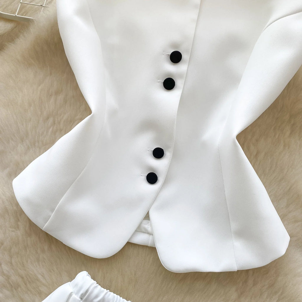 Chic Sleeveless Top & Pleated Mini Skirt Set